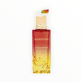 Rimaal Gulf Orchid Mangotini Eau de Parfum in einem rot-gelben Ombré-Flakon mit goldener Textur-Verzierung.