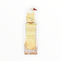 Rimaal Gulf Orchid Vanilla on the Beach Parfum mit goldenem Duft in einem künstlerischen Flakon mit Wellen-Design.
