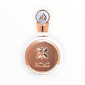 Rimaal Lattafa Fakhar Women Eau de Parfum in einer eleganten weißen Flasche mit roségoldenen Akzenten und Emblem.