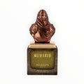 Maison Asrar Muharib Eau de Parfum 100ml von Rimaal in einem bronzefarbenen Flakon mit skulpturalem Verschluss.