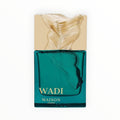 Maison Asrar Wadi Eau de Parfum 100 ml bei Rimaal in einem smaragdgrünen Glasflakon mit strukturiertem Golddeckel.